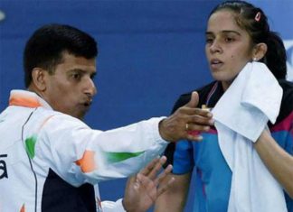 India's badminton ace Saina Nehwal and her coach Vimal Kumar.