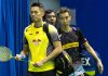 Lin Dan and Lee Chong Wei walking into the court to get ready for their match on Thursday. (photo: AFP)