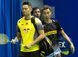 Lin Dan and Lee Chong Wei walking into the court to get ready for their match on Thursday. (photo: AFP)