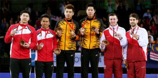 (L-R) Silver medalists Chayut Triyachart and Danny Bawa Chrisnanta of Singapore, gold medalists Tan Wee Kiong and Goh V Shem of Malaysia and bronze medalists Peter Mills and Chris Langridge of England at Glasgow 2014 Commonwealth Games.