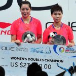 Yu Xiaohan (left) and Ou Dongni win women's doubles title of the OUE Singapore Open on April 12, 2015.