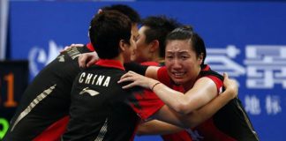 Wang Xiaoli (R) and Yu Yang of China celebrate victory after winning the 2013 BWF World Championships in Guangzhou.