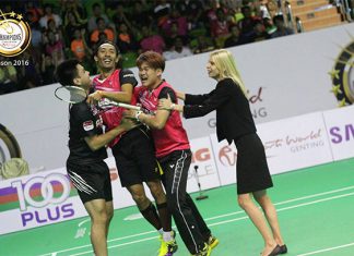 Syed Akhbar Shah Syed Mustakim swarmed by his teammates after winning the decisive second men's singles match. (photo: Purple League)