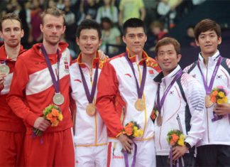 Denmark's Mathias Boe and Carsten Mogensen, (L) China's Cai Yun and Fu Haifeng (C) and South Korea's Chung Jae Sung and Lee Yong Dae (R) pose for pictures with their medals following the Men's Doubles badminton medal matches at the London 2012 Olympic Games in London, on August 5, 2012.