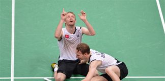Denmark's Mathias Boe (R) and Carsten Mogensen celebrate after their victory over Chung Jae Sung and Lee Yong Dae of South Korea in the semi-final men's doubles badminton match at the London 2012 Olympic Games in London on August 4, 2012. Denmark won the match 17-21, 21-18, 22-20.