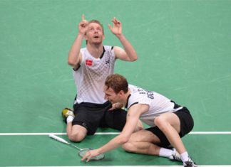 Denmark's Mathias Boe (R) and Carsten Mogensen celebrate after their victory over Chung Jae Sung and Lee Yong Dae of South Korea in the semi-final men's doubles badminton match at the London 2012 Olympic Games in London on August 4, 2012. Denmark won the match 17-21, 21-18, 22-20.