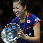 Nozomi Okuhara of Japan poses with the trophy during the awards ceremony after winning the 2016 All England women’s singles title. (photo: AP/Rui Vieira)