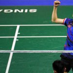 Angus Ng Ka Long(above), arms raised in triumph after defeating Chen Long in the quarter-finals of Singapore Open. (photo: Xinhua)