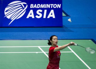 Li Xuerui wins a tought match against Porntip Buranaprasertsuk on Wednesday. (photo: AFP)