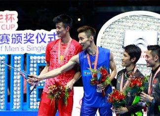 Lee Chong Wei (2nd L) of Malaysia uses a selfie stick to take photos with the runner-up Cheng Long (L) of China and the third place Tian Houwei (3rd L) of China and Lin Dan (R) of China on the podium after winning the men's singles final match against Chen Long of China at the 2016 Badminton Asia Championships. (photo: AFP)