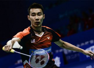 Lee Chong Wei returns a shot against France's Kai Schaefer. (photo: AFP)