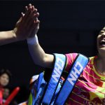 Wang Shixian of China celebrates her victory against Pusarla V Sindhu of India in the Uber Cup semi-final. (photo:AFP)