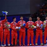 The Indonesia players hold their runner up medals during the 2016 Thomas Cup award ceremony. (photo: AFP)