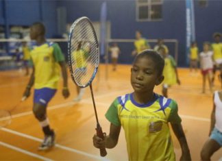 Brazilian children are practicing badminton following the Samba beat. (photo: New York Times)