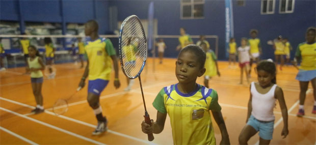Brazilian children are practicing badminton following the Samba beat. (photo: New York Times) Brazilian children are practicing badminton following the Samba beat. (photo: New York Times)