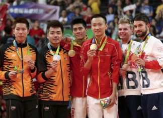 Silver medallists Goh V Shem and Tan Wee Kiong of Malaysia (from left), gold medallists Fu Haifeng and Zhang Nan of China, and bronze medallists Marcus Ellis and Chris Langridge of Britain pose on the podium. (photo: Reuters)
