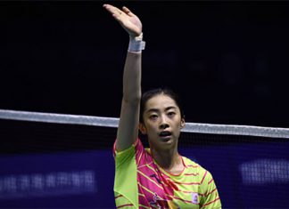 Goodbye and good luck to Wang Shixian. (photo: AP)