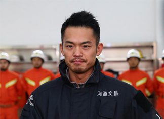 Lin Dan is wearing firefighters' uniform.