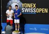 Lin Dan(left) holds the Swiss Open trophy as he poses with Shi Yuqi. (photo: BWF)