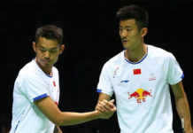 Lin Dan shakes hand with Chen Long. (photo: AP)