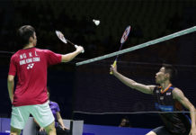 Angus Ng Ka Long tries to block a shot from Lee Chong Wei during the China Open quarter-finals. (photo: AP)