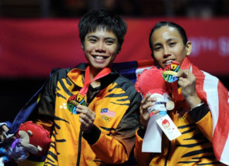 Congratulations and good luck to Amelia Alicia Anscelly (right) on her new job. (photo: Bernama)
