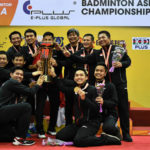 Indonesia team celebrates on the podium with the 2018 Badminton Asia Team Championships trophy. (photo: AP)
