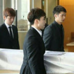 Lee Yong-Dae carries the coffin at the funeral of Jung Jae-Sung.