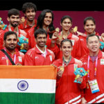 Tan Kim Her (front row, second from right) celebrates after India beat Malaysia 3-1 in Commonwealth Games mixed team final. (photo: AP)