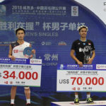 Anthony Sinisuka Ginting shocks Kento Momota to win China Open Anthony Sinisuka Ginting (R) stands on the podium with Kento Momota. (photo: AFP)