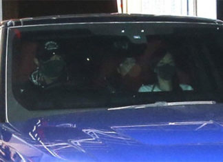 Lee Chong Wei and family leave Subang airport with a blue SUV. (photo: Sinchew)