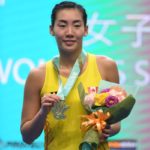 Michelle Li smiles as she celebrates her Macau Open victory. (photo: AFP)