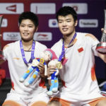 Wang Yilyu/Huang Dongping pose for picture after their 2018 BWF World Tour Finals victory. (photo AFP)