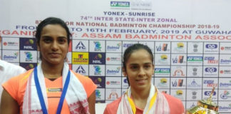 Saina Nehwal defeats PV Sindhu (L) to retain the 2019 India National Badminton Championship title. (photo: BAI Media)
