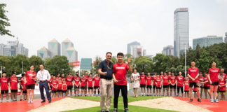 Poul-Erik Hoyer Larsen officiates the AirBadminton launch with Dong Jiong. (photo: BWF)