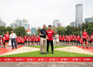 Poul-Erik Hoyer Larsen officiates the AirBadminton launch with Dong Jiong. (photo: BWF)