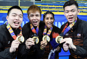 Aaron Chia (from left), Soh Wooi Yik, Selvaduray Kisona and Lee Zii Jia display their SEA Games gold medals. (photo: Bernama)