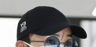 Kento Momota returns home from a fatal car accident in Malaysia. (photo: AFP)