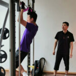 Chen Long is doing strength training. (photo: Xinhua)