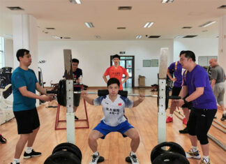 Shi Yuqi is doing a leg workout. (photo: Xinhua)