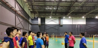 Flandi Limpele (pink shirt) is maximizing practice time for BAM's men's doubles players. (photo: BAM)