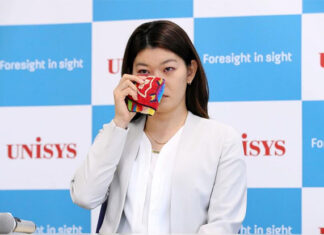 Ayaka Takahashi shows vulnerability and tears during her retirement speech. (photo: Nihon Unisys)