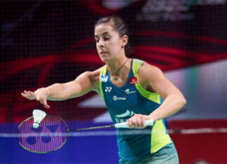 Carolina Marin battles through the first-round test at SaarLorLux Open. (photo: Lars Ronbog / FrontZoneSport via Getty Images)