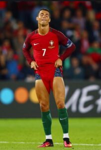 Cristiano Ronaldo pulls up shorts before free-kick. (photo: Getty)
