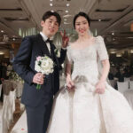 Son Wan Ho and Sung Ji Hyun pose for pictures at the wedding ceremony. (photo: Instagram)