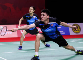 Tan Kian Meng resumes his mixed doubles partnership with Lai Pei Jing. (photo: Shi Tang/Getty Images)