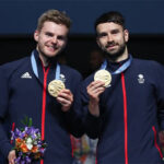Marcus Ellis/Chris Langridge win gold at the 2019 European Games. (photo: BWF)