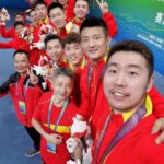 Liu Cheng (right 1) and Chen Long (right 2) celebrates with teammates after winning the 2021 China's 14th National Games men's team title. (photo: Chen Long's Weibo)
