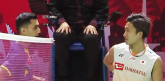 Kento Momota tells Lakshya Sen he has a back injury after retiring from the 2021 BWF World Tour Finals.