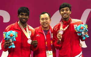 Tan Kim Her and Mulyo Handoyo could return to India as badminton coaches. (photo: Tan Kim Her's Facebook)